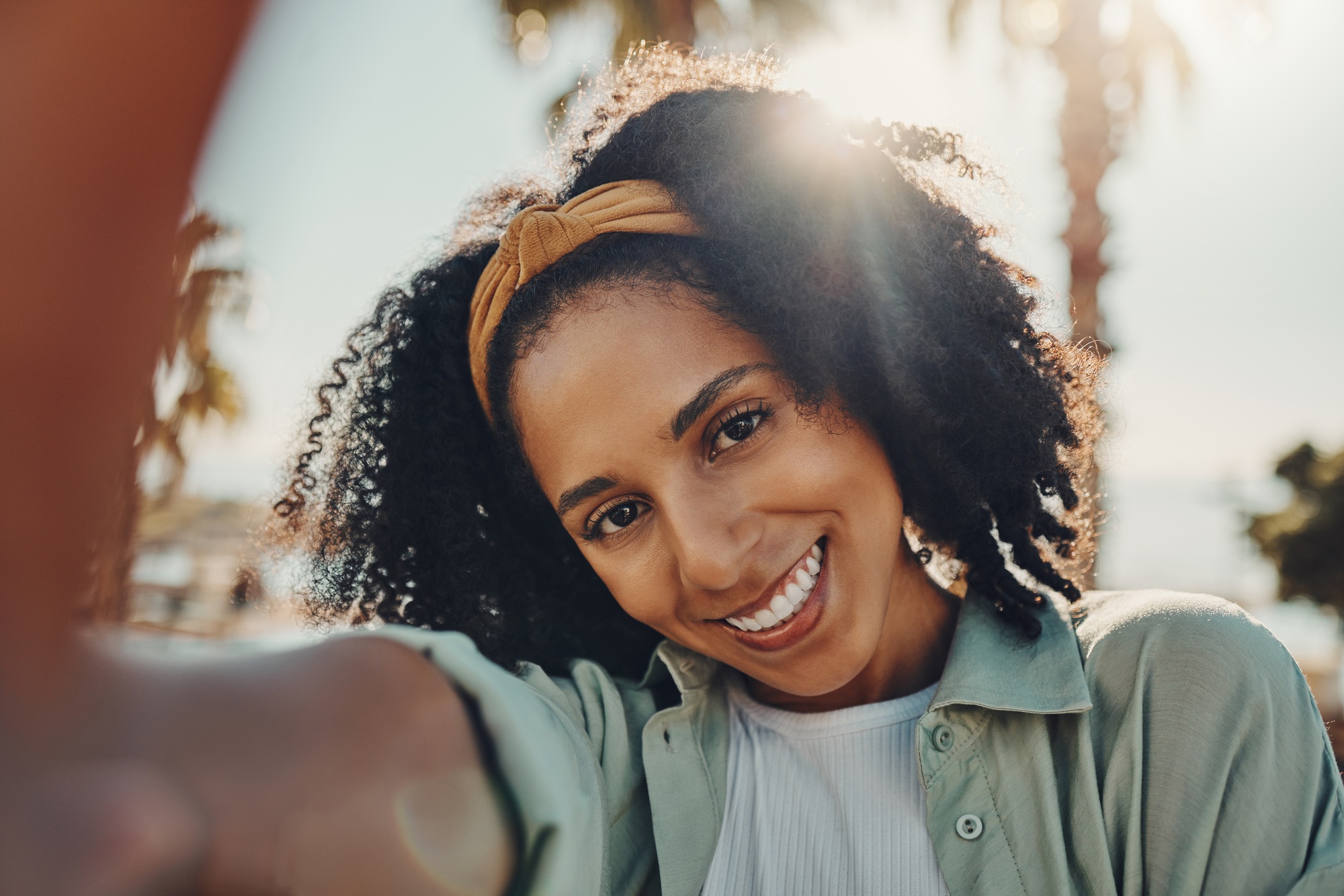 Portrait, selfie smile and happy black woman taking pictures to remember memory, social media or pr